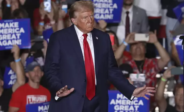 Republican presidential nominee former President Donald Trump dances at a campaign rally at Bayfront Convention Center in Erie, Pa., Sunday, Sept. 29, 2024. (AP Photo/Rebecca Droke)