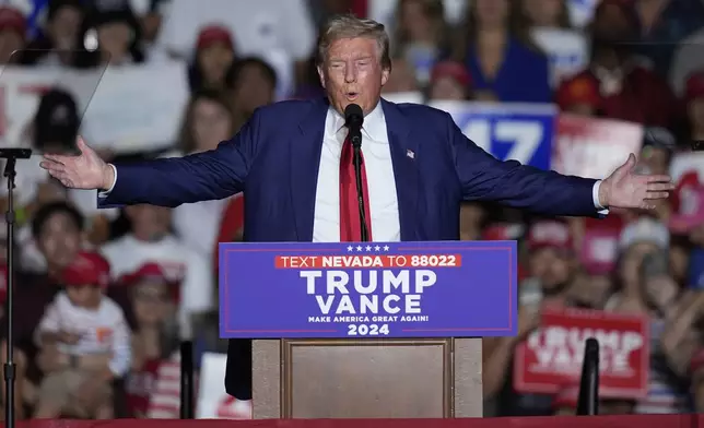 Republican presidential nominee former President Donald Trump speaks during a campaign event at the World Market Center, Friday, Sept.13, 2024, in Las Vegas. (AP Photo/John Locher)