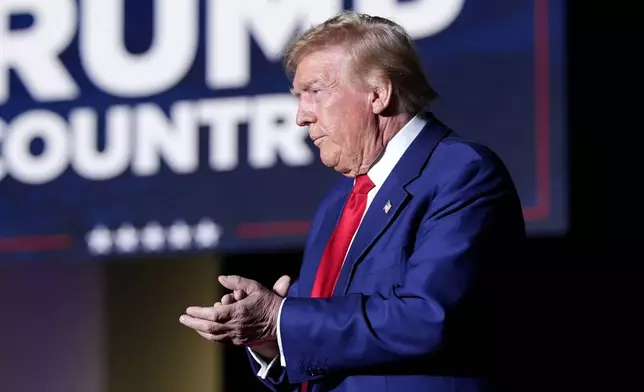 Republican presidential nominee former President Donald Trump arrives to speak during a campaign event at the World Market Center, Friday, Sept.13, 2024, in Las Vegas. (AP Photo/Alex Brandon)