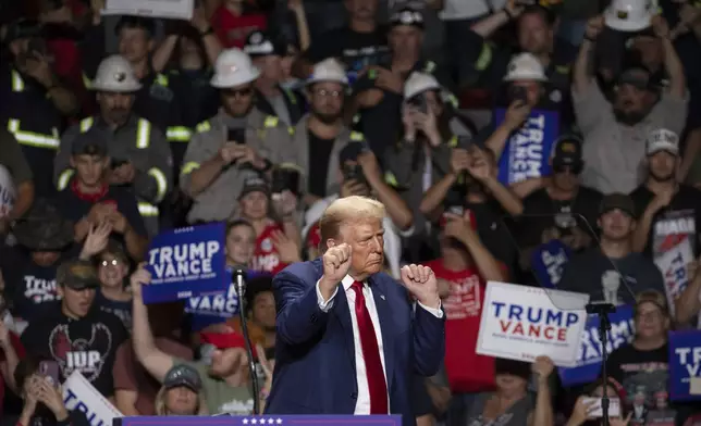 Republican presidential nominee former President Donald Trump dances after finishing his remarks at a campaign rally at Ed Fry Arena in Indiana, Pa., Monday, Sept. 23, 2024. (AP Photo/Rebecca Droke)