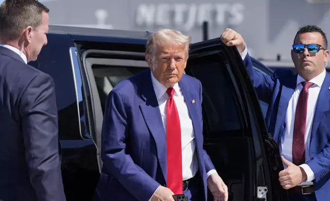 Republican presidential nominee former President Donald Trump arrives at Harry Reid International Airport to board a plane after a campaign trip, Saturday, Sept.14, 2024, in Las Vegas. (AP Photo/Alex Brandon)