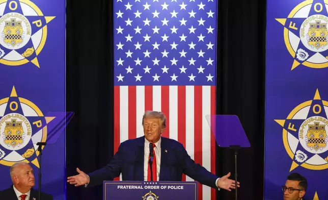 Republican presidential nominee former President Donald Trump speaks to the Fraternal Order of Police in Charlotte, N.C., Friday, Sept. 6, 2024. (AP Photo/Nell Redmond)