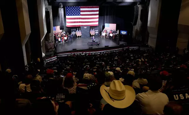 Supporters listen as Republican presidential nominee former President Donald Trump speaks during a campaign event at the Linda Ronstadt Music Hall, Thursday, Sept.12, 2024, in Tucson, Ariz. (AP Photo/Alex Brandon)