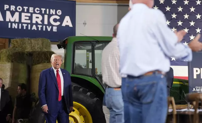 Republican presidential nominee former President Donald Trump arrives to speak at a campaign event at a farm, Monday, Sept. 23, 2024, in Smithton, Pa. (AP Photo/Alex Brandon)