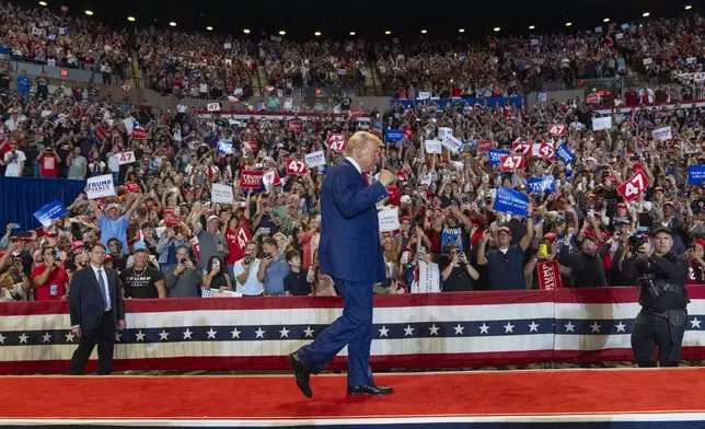 Republican presidential nominee former President Donald Trump arrives to speak at a campaign event at Nassau Coliseum, Wednesday, Sept.18, 2024, in Uniondale, N.Y. (AP Photo/Alex Brandon)