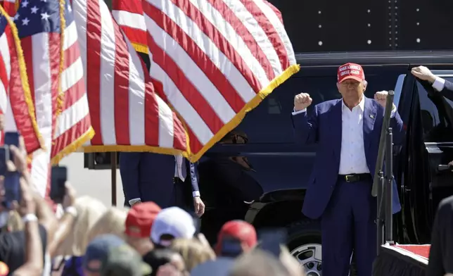 Republican presidential nominee former President Donald Trump arrives at a campaign event at Wilmington International Airport in Wilmington, N.C., Saturday, Sept. 21, 2024. (AP Photo/Chris Seward)