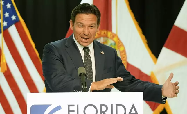 Florida Gov. Ron DeSantis delivers remarks and answers questions at a news conference Monday, Sept. 16, 2024, in Orlando, Fla. (AP Photo/John Raoux)