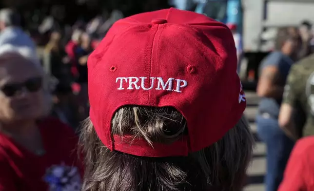 A supporter waits for Republican presidential nominee former President Donald Trump to arrive at a rally, Saturday, Sept. 28, 2024, in Prairie du Chien, Wis. (AP Photo/Charlie Neibergall)