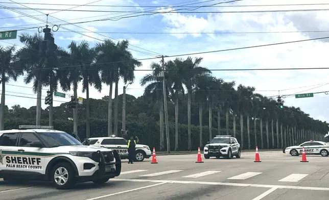 Sheriff vehicles are pictured near Trump International Golf Club, Sunday. Sept. 15, 2024, in West Palm Beach, Fla., after gunshots were reported in the vicinity of Republican presidential candidate former President Donald Trump. (AP Photo/Stephany Matat)