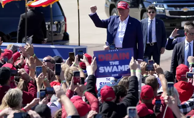 Republican presidential nominee former President Donald Trump arrives to speak during a campaign event at Central Wisconsin Airport, Saturday, Sept. 7, 2024, in Mosinee, Wis. (AP Photo/Morry Gash)