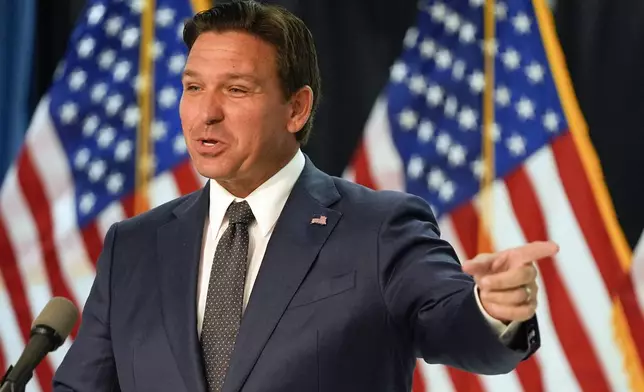 Florida Gov. Ron DeSantis delivers remarks and answers questions at a news conference Monday, Sept. 16, 2024, in Orlando, Fla. (AP Photo/John Raoux)