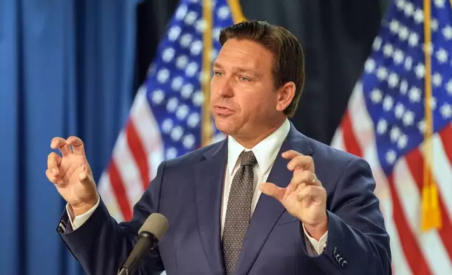 Florida Gov. Ron DeSantis delivers remarks and answers questions at a news conference Monday, Sept. 16, 2024, in Orlando, Fla. (AP Photo/John Raoux)