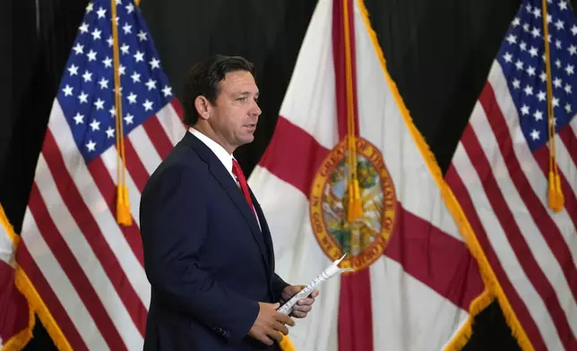 Florida Gov. Ron DeSantis arrives for a news conference in the aftermath of the apparent assassination attempt of Republican presidential nominee and former President Donald Trump Tuesday, Sept. 17, 2024, in West Palm Beach, Fla. (AP Photo/Lynne Sladky)