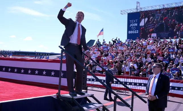 Republican Senate candidate Eric Hovde gestures after speaking at a campaign event for Republican presidential nominee former President Donald Trump at Central Wisconsin Airport, Saturday, Sept. 7, 2024, in Mosinee, Wis. (AP Photo/Alex Brandon)