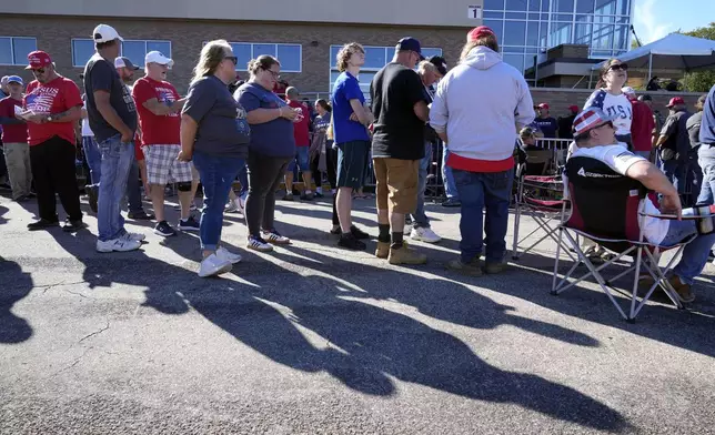 Supporters wait for Republican presidential nominee former President Donald Trump to arrive at a rally, Saturday, Sept. 28, 2024, in Prairie du Chien, Wis. (AP Photo/Charlie Neibergall)