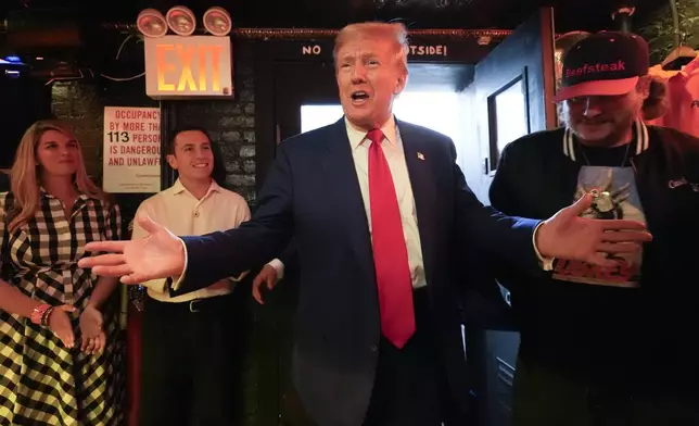 Republican presidential nominee former President Donald Trump makes a campaign stop at Pubkey Bar and Media House, Wednesday, Sept.18, 2024, in New York. (AP Photo/Alex Brandon)