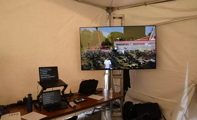 FILE - A view inside a tent at a campaign rally for Republican presidential candidate former President Donald Trump shows a video monitor after Trump was the target of an assassination attempt Saturday, July 13, 2024, in Butler, Pa. (AP Photo/Evan Vucci, File)