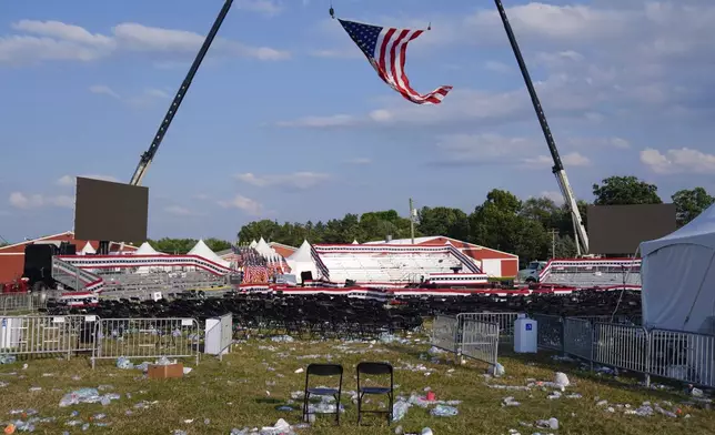 FILE - A campaign rally site for Republican presidential candidate former President Donald Trump is empty and littered with debris July 13, 2024, in Butler, Pa. (AP Photo/Evan Vucci, File)