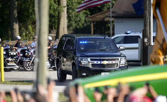 FILE - A motorcade with Republican presidential candidate former President Donald Trump arrives at a campaign event in Butler, Pa., July 13, 2024. (AP Photo/Gene J. Puskar, File)