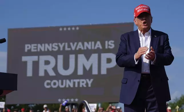 FILE - Republican presidential candidate former President Donald Trump arrives for a campaign rally, July 13, 2024, in Butler, Pa. (AP Photo/Evan Vucci, File)