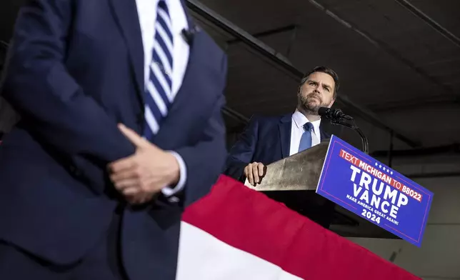 Republican vice presidential nominee JD Vance speaks during a campaign stop at Apple Valley Events in Sparta, Mich., Tuesday, Sept. 17, 2024. (Isaac Ritchey/The Grand Rapids Press via AP)