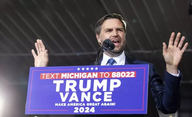 Republican vice presidential nominee JD Vance speaks during a campaign stop at Apple Valley Events in Sparta, Mich., Tuesday, Sept. 17, 2024. (Isaac Ritchey/The Grand Rapids Press via AP)