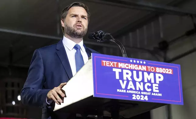 Republican vice presidential nominee JD Vance speaks during a campaign stop at Apple Valley Events in Sparta, Mich., Tuesday, Sept. 17, 2024. (Isaac Ritchey/The Grand Rapids Press via AP)