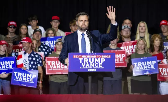 Republican vice presidential nominee JD Vance speaks during a campaign stop at Apple Valley Events in Sparta, Mich., Tuesday, Sept. 17, 2024. (Isaac Ritchey/The Grand Rapids Press via AP)