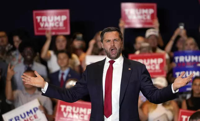 Republican vice presidential nominee Sen. JD Vance, R-Ohio, gestures to supporters at a campaign event, Thursday, Sept. 5, 2024, in Phoenix. (AP Photo/Matt York)