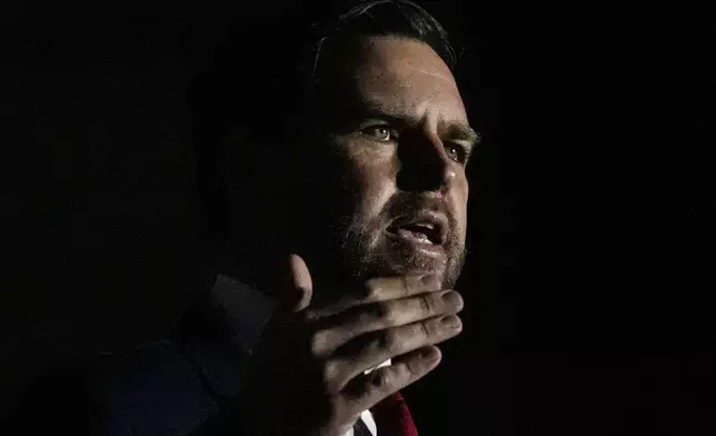 Republican vice presidential nominee Sen. JD Vance, R-Ohio, speaks during the Georgia Faith and Freedom Coalition's dinner at the Cobb Galleria Centre, Monday, Sept. 16, 2024, in Atlanta. (AP Photo/Mike Stewart)