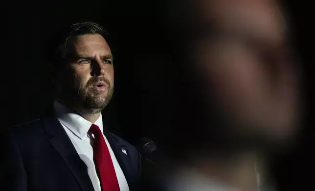 Republican vice presidential nominee Sen. JD Vance, R-Ohio, speaks during the Georgia Faith and Freedom Coalition's dinner at the Cobb Galleria Centre, Monday, Sept. 16, 2024, in Atlanta. (AP Photo/Mike Stewart)