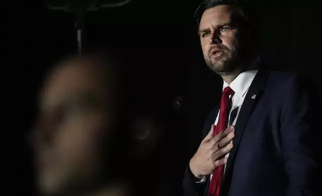 Republican vice presidential nominee Sen. JD Vance, R-Ohio, speaks during the Georgia Faith and Freedom Coalition's dinner at the Cobb Galleria Centre, Monday, Sept. 16, 2024, in Atlanta. (AP Photo/Mike Stewart)