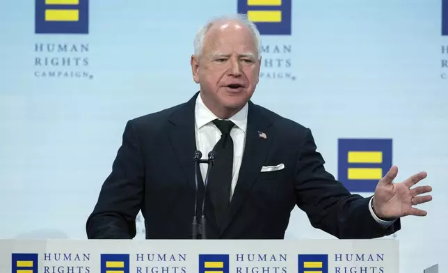 Democratic vice presidential candidate Minnesota Gov. Tim Walz speaks during the Human Rights Campaign (HRC) National Dinner at Walter E. Washington Convention Center in Washington, Saturday, Sept. 7, 2024. (AP Photo/Jose Luis Magana)