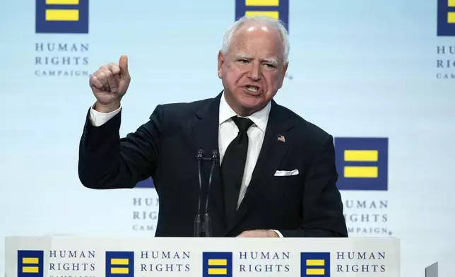 Democratic vice presidential candidate Minnesota Gov. Tim Walz speaks during the Human Rights Campaign (HRC) National Dinner at Walter E. Washington Convention Center in Washington, Saturday, Sept. 7, 2024. (AP Photo/Jose Luis Magana)