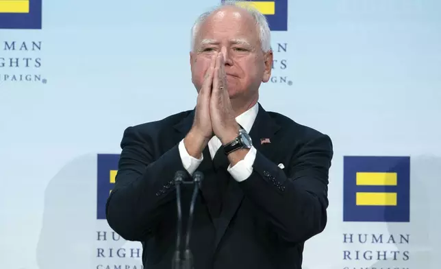 Democratic vice presidential candidate Minnesota Gov. Tim Walz speaks during the Human Rights Campaign (HRC) National Dinner at Walter E. Washington Convention Center in Washington, Saturday, Sept. 7, 2024. (AP Photo/Jose Luis Magana)