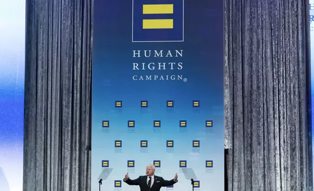 Democratic vice presidential candidate Minnesota Gov. Tim Walz speaks during the Human Rights Campaign (HRC) National Dinner at Walter E. Washington Convention Center in Washington, Saturday, Sept. 7, 2024. (AP Photo/Jose Luis Magana)