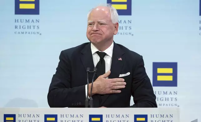 Democratic vice presidential candidate Minnesota Gov. Tim Walz speaks during the Human Rights Campaign (HRC) National Dinner at Walter E. Washington Convention Center in Washington, Saturday, Sept. 7, 2024. (AP Photo/Jose Luis Magana)