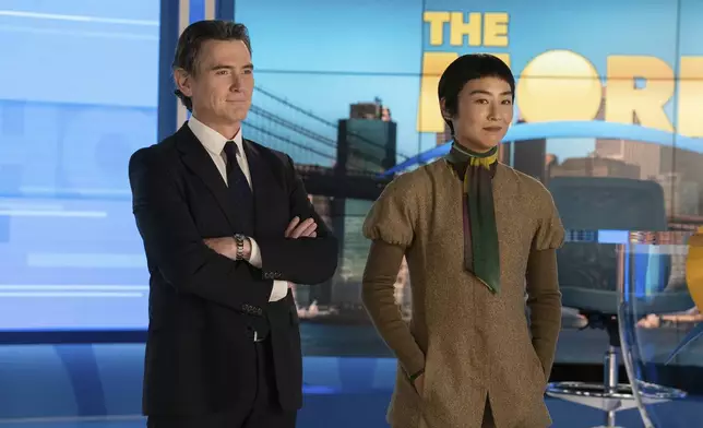 This image released by Apple TV+ shows Billy Crudup, left, and Greta Lee in a scene from "The Morning Show." (Apple TV+ via AP)