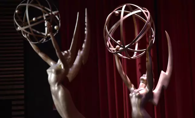 FILE - Emmy statues appear on stage at the 70th Primetime Emmy nominations announcement in Los Angeles on July 12, 2018. (Photo by Chris Pizzello/Invision/AP, File)