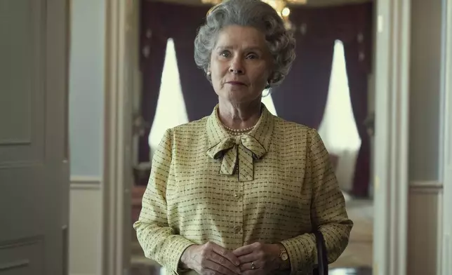 This image released by Netflix shows Imelda Staunton as Queen Elizabeth in "The Crown." (Alex Bailey/Netflix via AP)