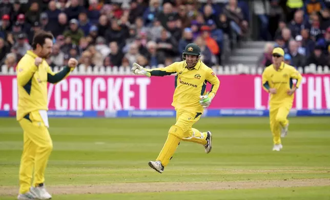 Australia's Josh Inglis celebrates stumping the wicket of England's Jacob Bethell during the fifth one day international match at the Seat Unique Stadium, Bristol, England, Sunday Sept. 29, 2024. (Adam Davy/PA via AP)