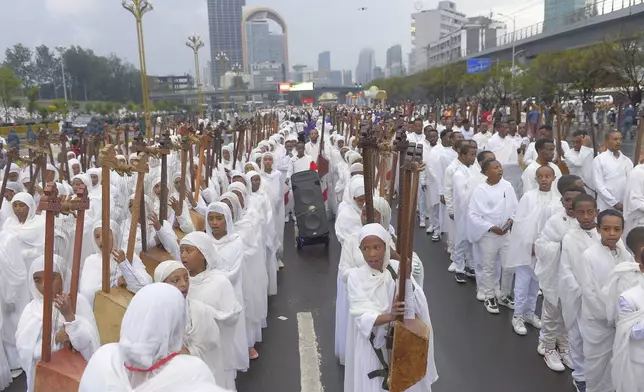 Religious leaders and Ethiopians celebrate Meskel, meaning the Cross in Amharic, is an annual religious holiday among Orthodox in Addis Ababa, Ethiopia Thursday, Sept. 26, 2024. (AP Photo)