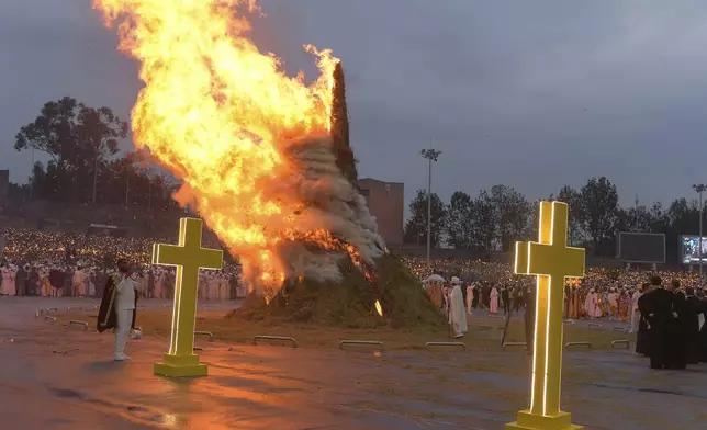 Religious leaders and Ethiopians celebrate Meskel, meaning the Cross in Amharic, is an annual religious holiday among Orthodox in Addis Ababa, Ethiopia Thursday, Sept. 26, 2024. (AP Photo)