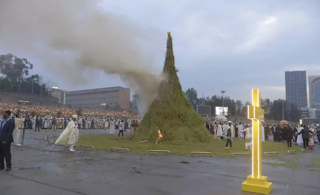 Religious leaders sing to celebrate Meskel, meaning the Cross in Amharic, is an annual religious holiday among Orthodox in Addis Ababa, Ethiopia Thursday, Sept. 26, 2024. (AP Photo)