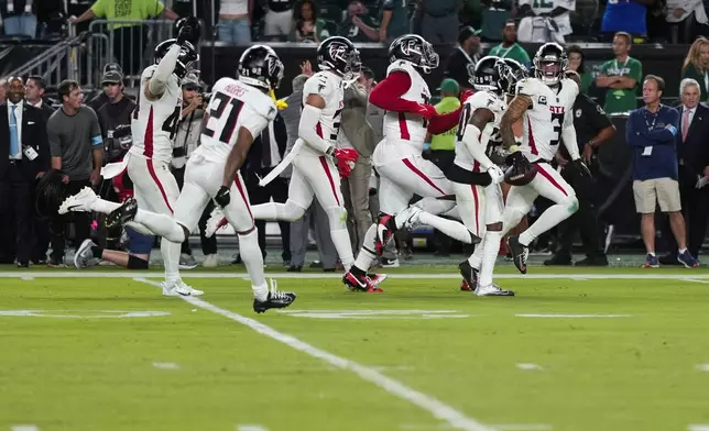 Atlanta Falcons safety Jessie Bates III (3) reacts to intercepting a pass during the second half of an NFL football game against the Philadelphia Eagles on Monday, Sept. 16, 2024, in Philadelphia. (AP Photo/Matt Slocum)