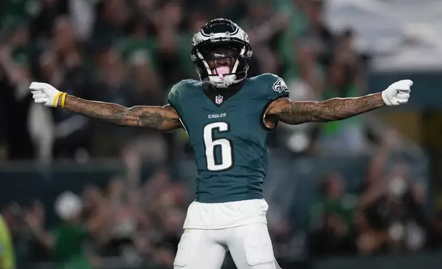 Philadelphia Eagles wide receiver DeVonta Smith celebrates his touchdown during the first half of an NFL football game against the Atlanta Falcons on Monday, Sept. 16, 2024, in Philadelphia. (AP Photo/Matt Slocum)