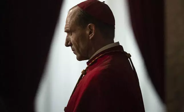 This image released by Focus Features shows Ralph Fiennes as Cardinal Lawrence in a scene from "Conclave." (Focus Features via AP)