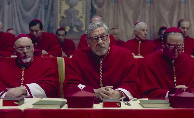 This image released by Focus Features shows Sergio Castellitto as Cardinal Tedesco, center, in a scene from "Conclave." (Focus Features via AP)