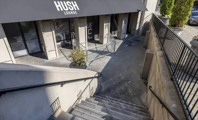 The scene of a fatal Saturday night shooting outside Hush, a hookah lounge, in the Five Points neighborhood of Birmingham, Ala., Sunday, Sept. 22, 2024. (AP Photo/Vasha Hunt)