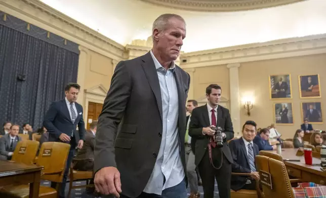 Former NFL quarterback Brett Favre arrives to appear before the House Committee on Ways and Means on Capitol Hill, Tuesday, Sept. 24, 2024, in Washington. (AP Photo/Mark Schiefelbein)